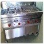 Barbecue gaz rotatif pierre volcanique sur meuble